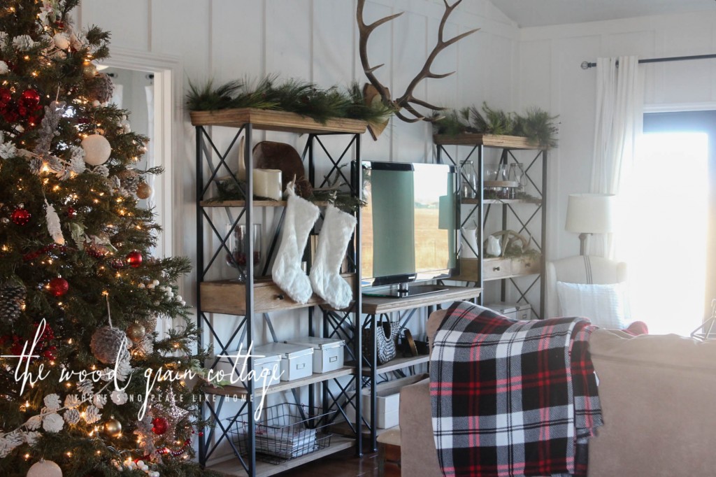 I layered a bunch of blankets, pillows and cozy elements to our living room. We spend the most time in here, so it makes it easy to curl up on the couch and look at the twinkling lights of the Christmas tree. You can take the full tour of our Christmas Tree here. 