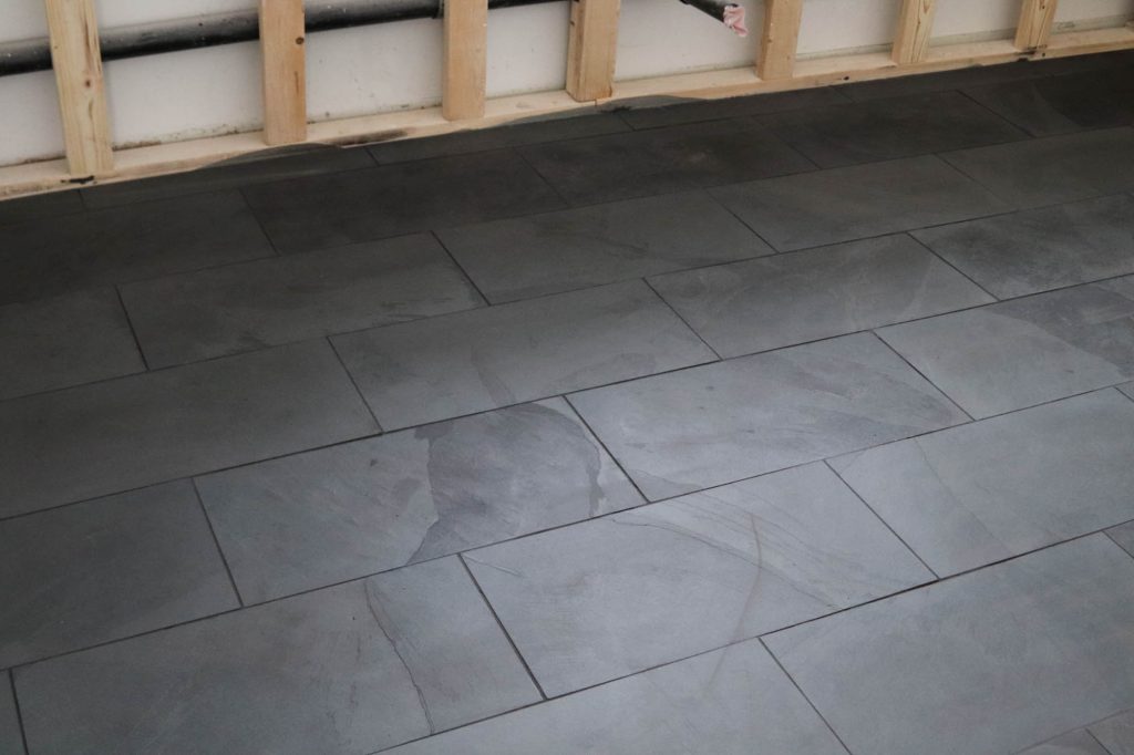 Black Tile In The Laundry Room by The Wood Grain Cottage