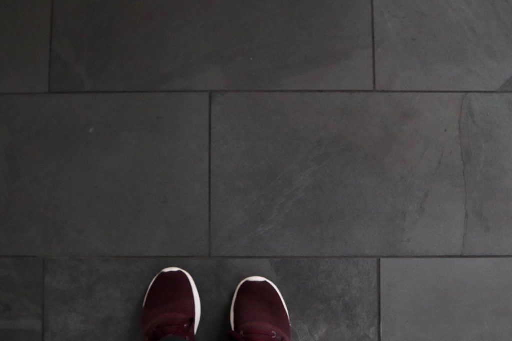 Black Tile In The Laundry Room by The Wood Grain Cottage