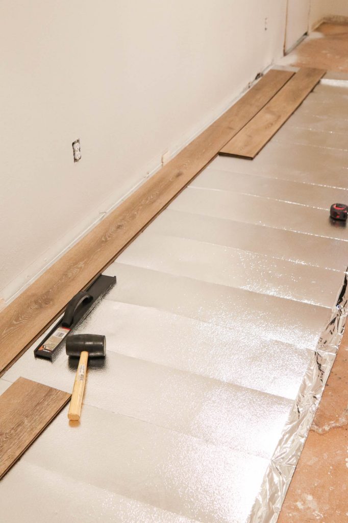 How We Installed Our Laminate Flooring by The Wood Grain Cottage