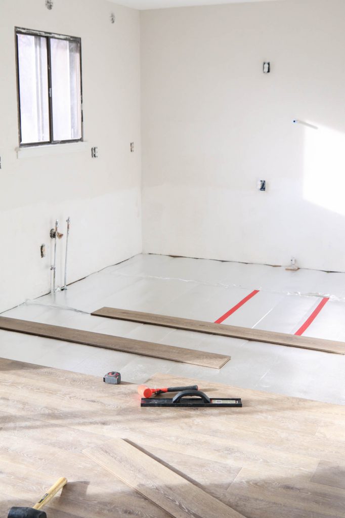 How We Installed Our Laminate Flooring by The Wood Grain Cottage