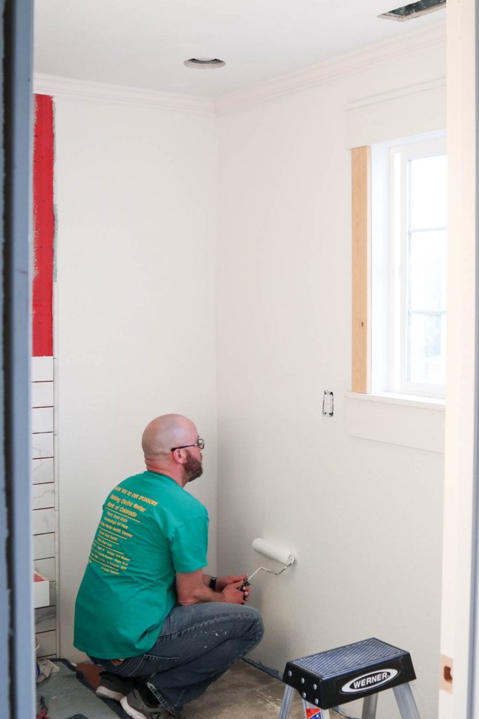 A picture of Todd painting the walls. 