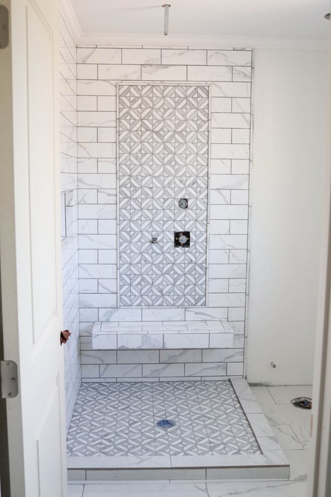 A picture of the bathroom tile finished. 