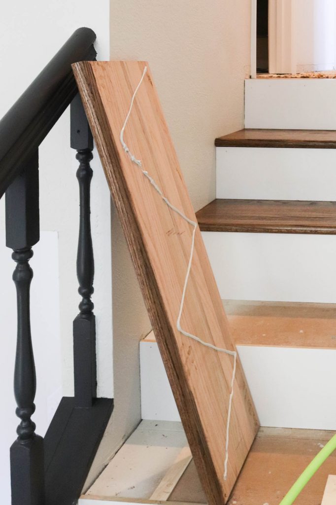 A picture of a stair tread with liquid nails.