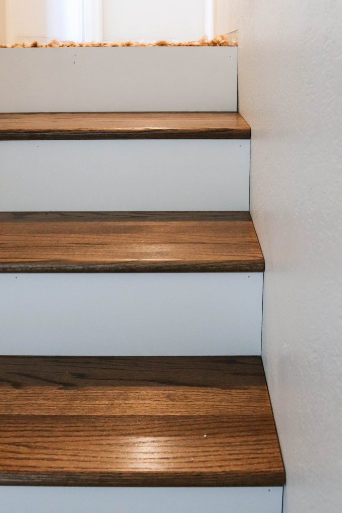 A picture showing gaps on each side of the stair risers.