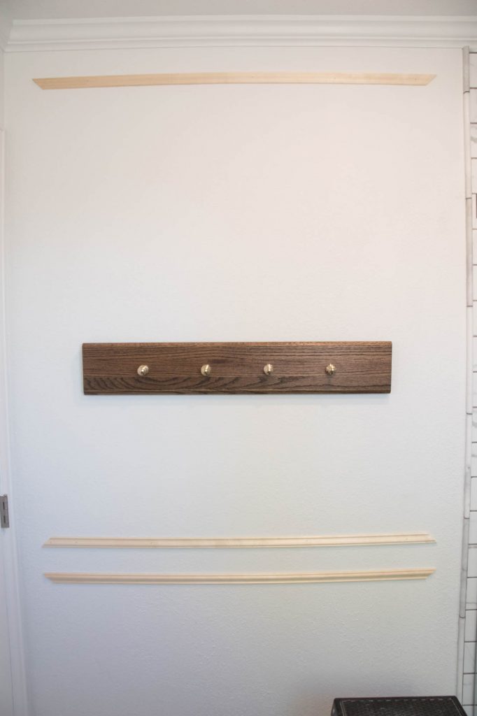 A picture of the wall showing the horizontal pieces installed.