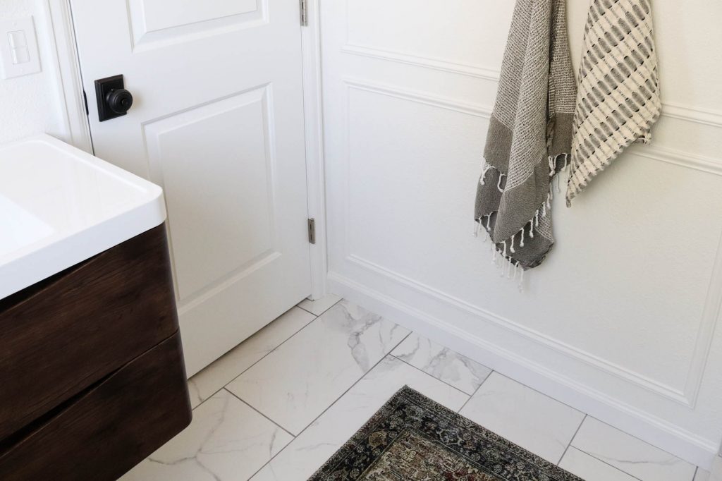 A picture of our bathroom with the wall moulding finished. 