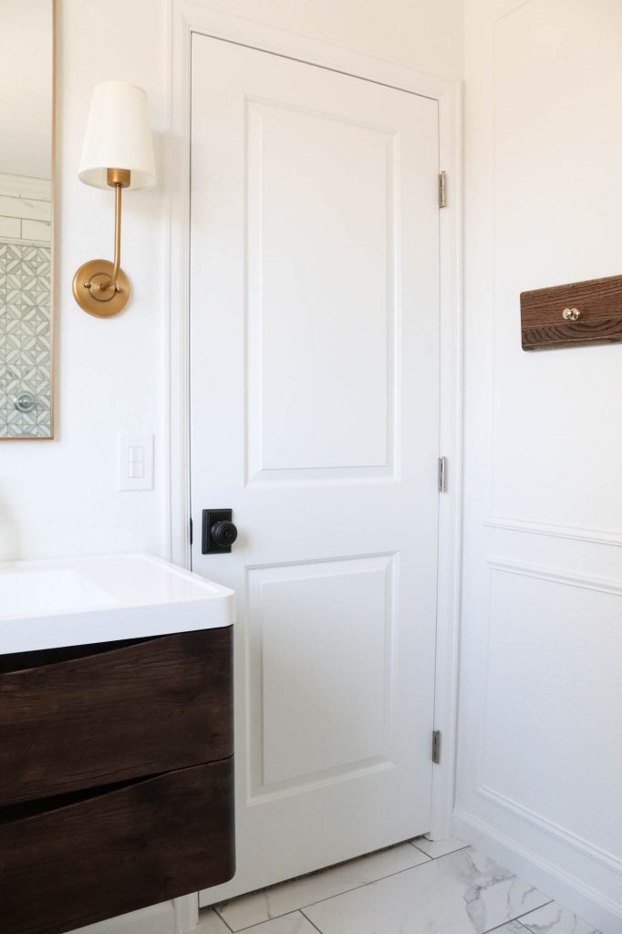 A picture of our bathroom with the wall moulding finished. 