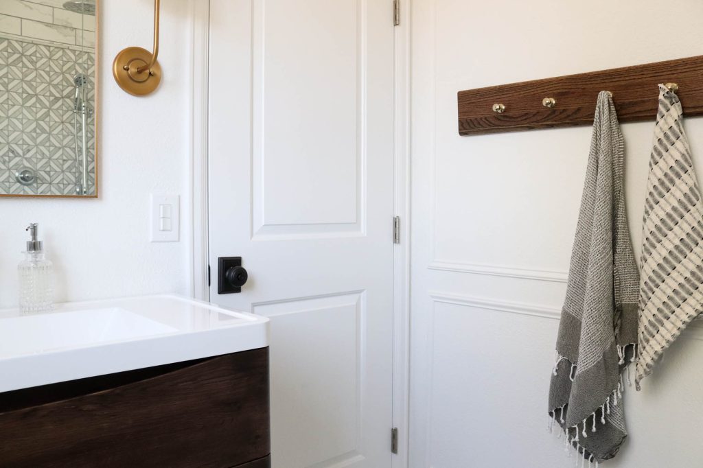 A picture of our bathroom with the wall moulding finished. 