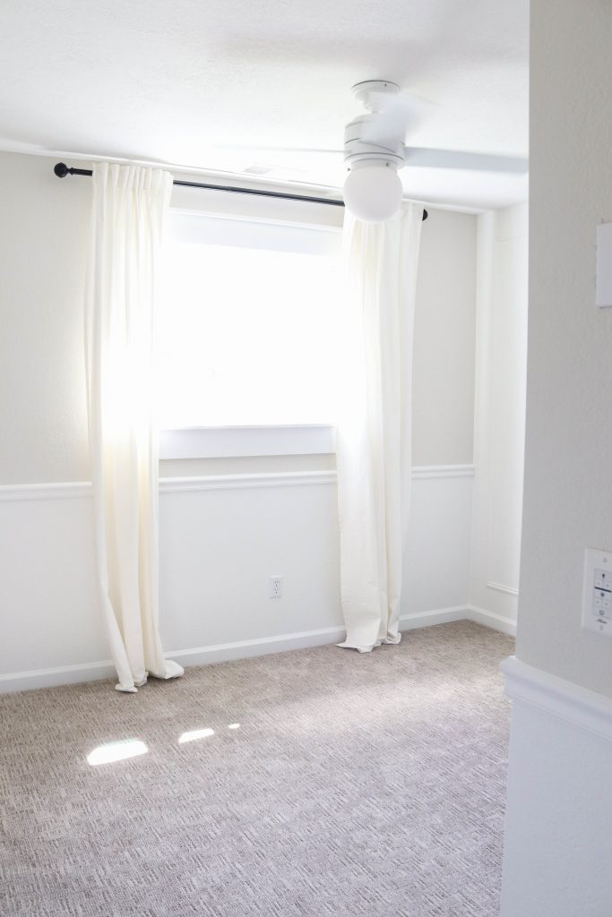 A picture of the finished wall moulding in the nursery.