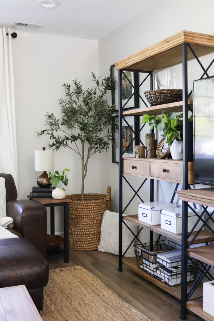 A picture of the living room shelves decorated for Summer. 