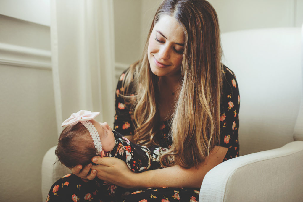 A picture of Shayna holding the baby.