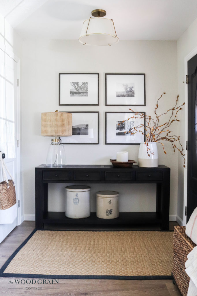 A picture of our entryway with new art.