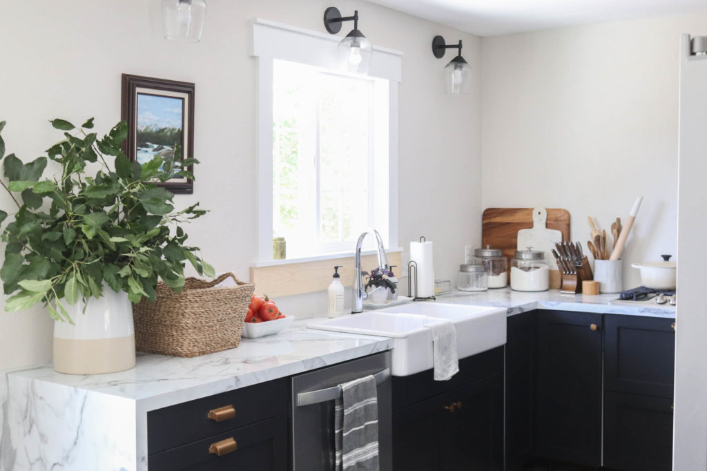 A picture of our kitchen without a backsplash.