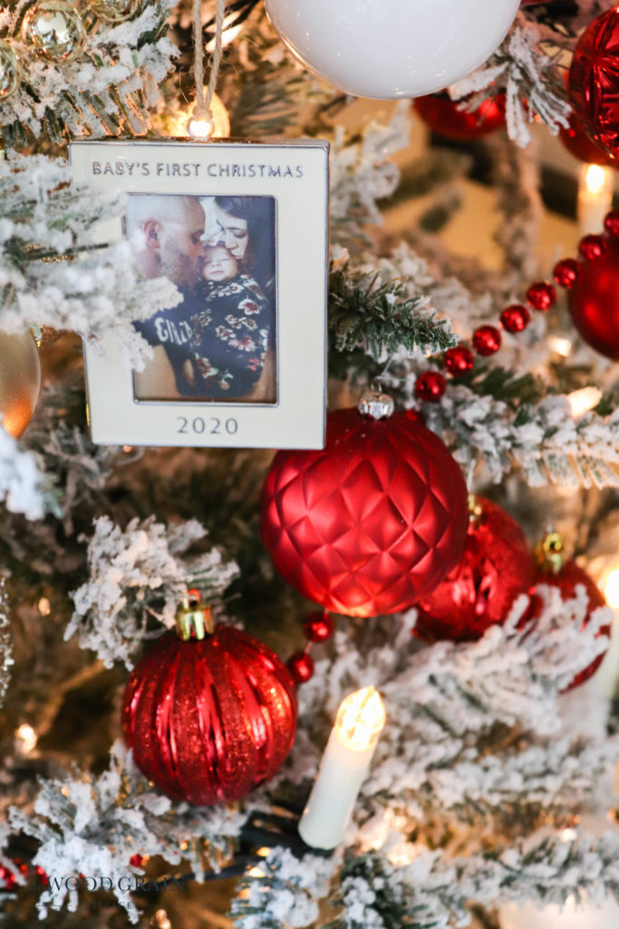 A picture showing Ania's baby first Christmas ornament.