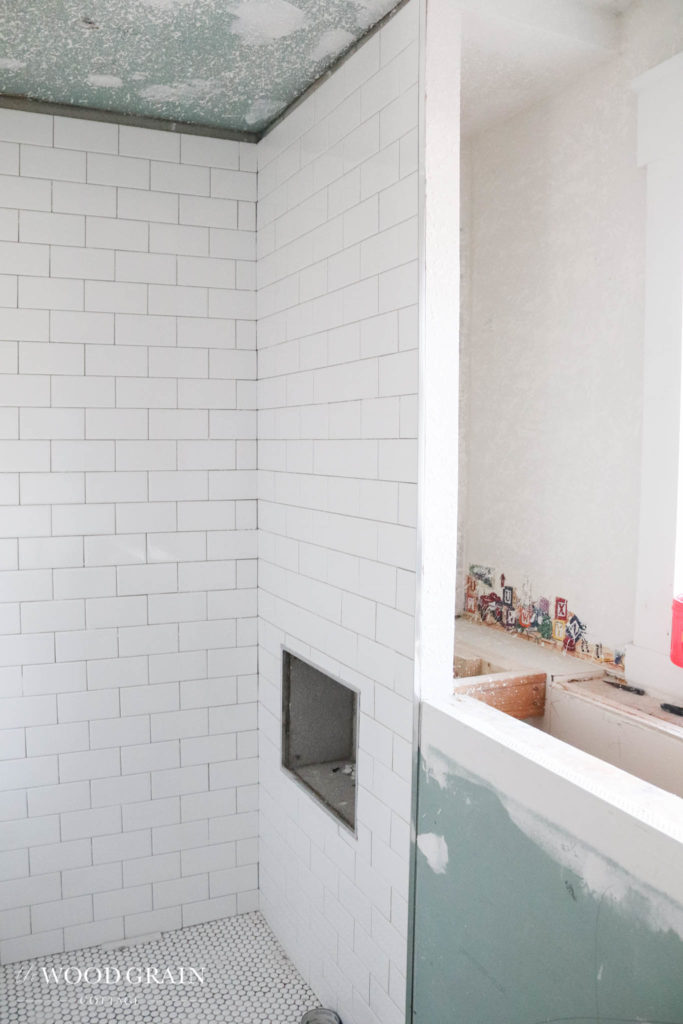 A picture of subway tile in the shower.