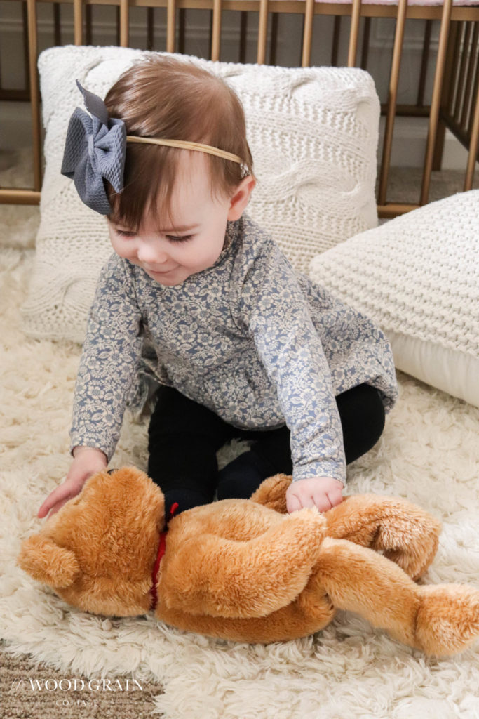 A picture of Ania and her teddy bear.