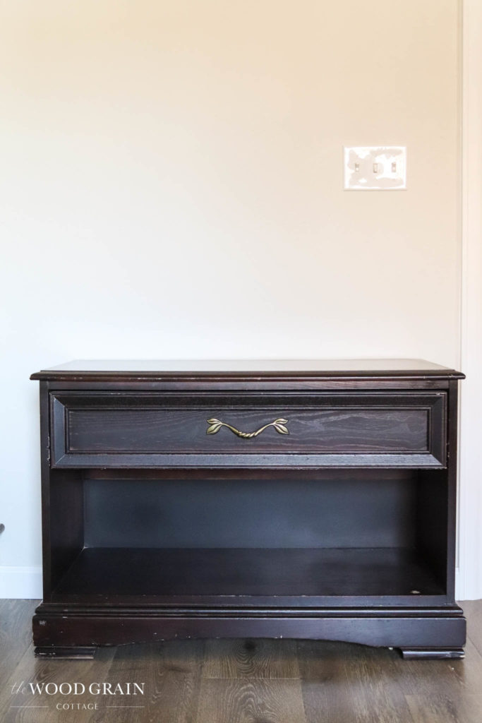 A picture of the nightstand before the makeover.