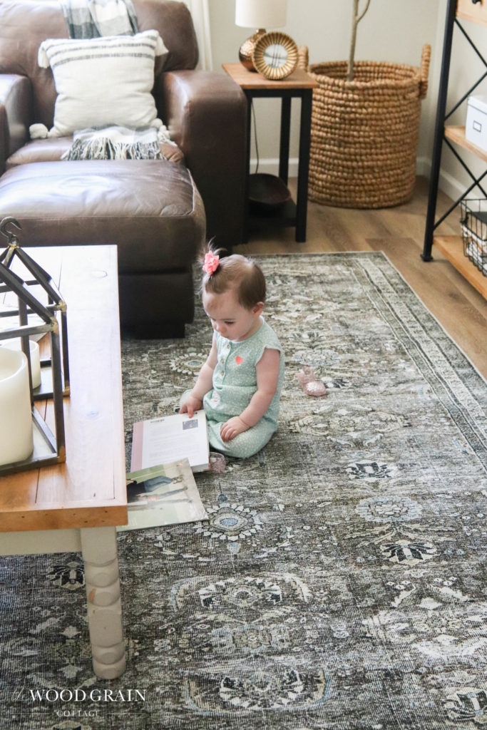 A picture of Ania on our new living room rug. 