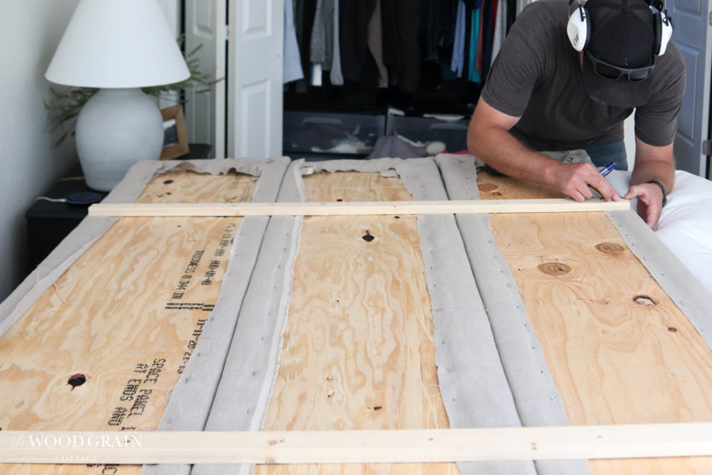 A picture of Todd measuring for the mounting hardware. 