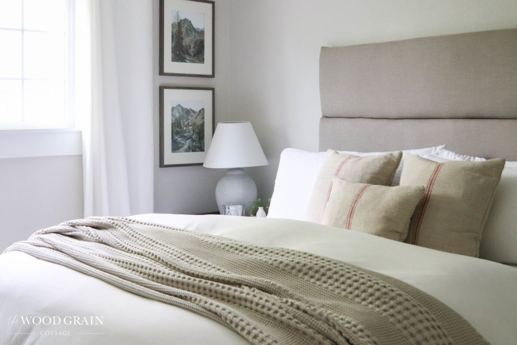 A picture showing our bedroom and the new headboard. 