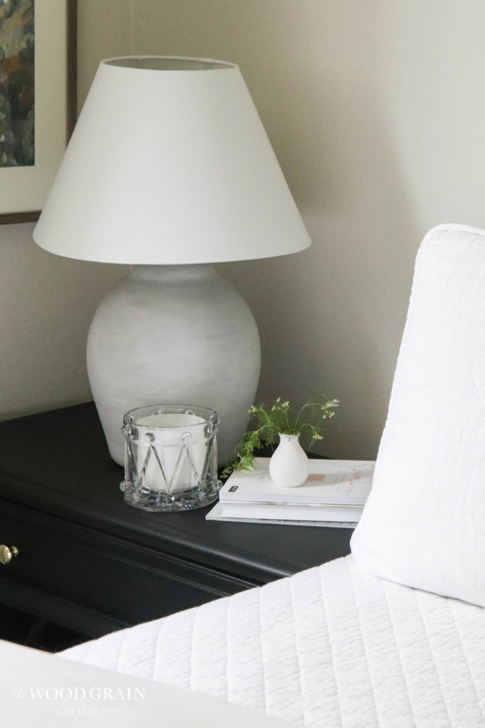A picture of our nightstand and lamp.