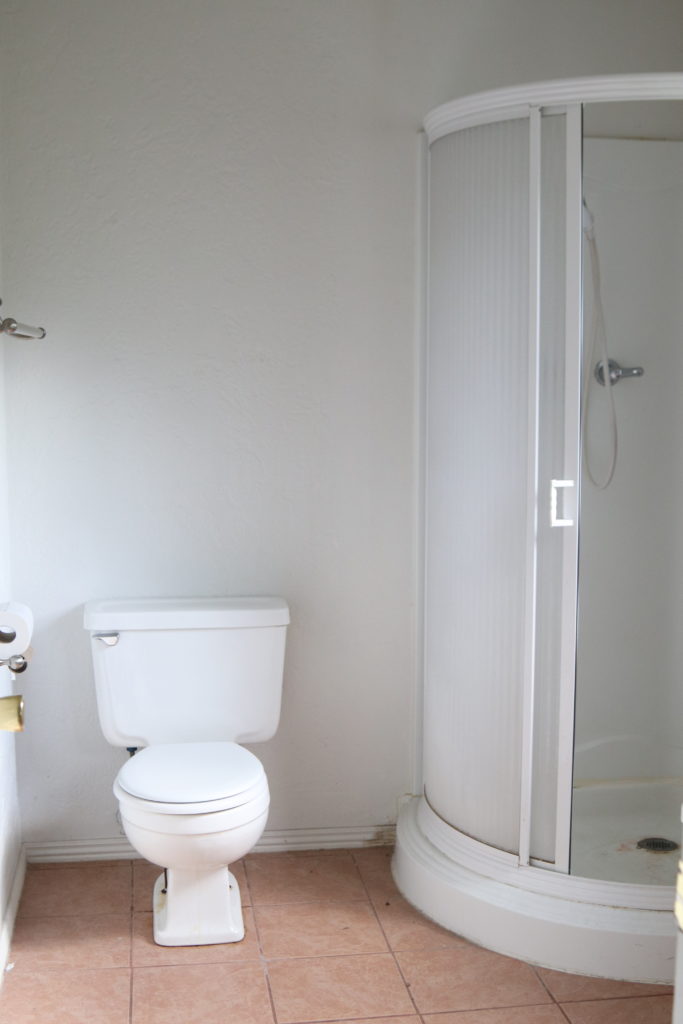 A picture of the bathroom shower before.