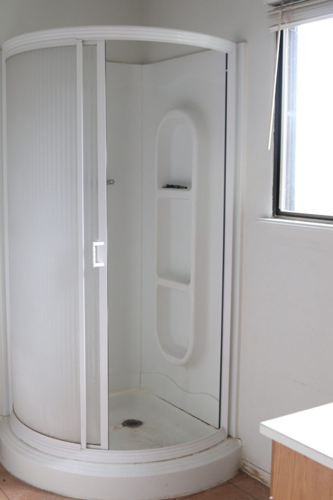 A picture of the shower before the remodel. 