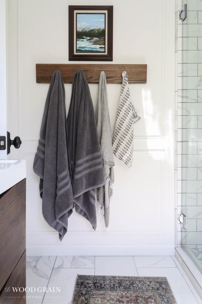 A picture of the wall with our towel rack. 