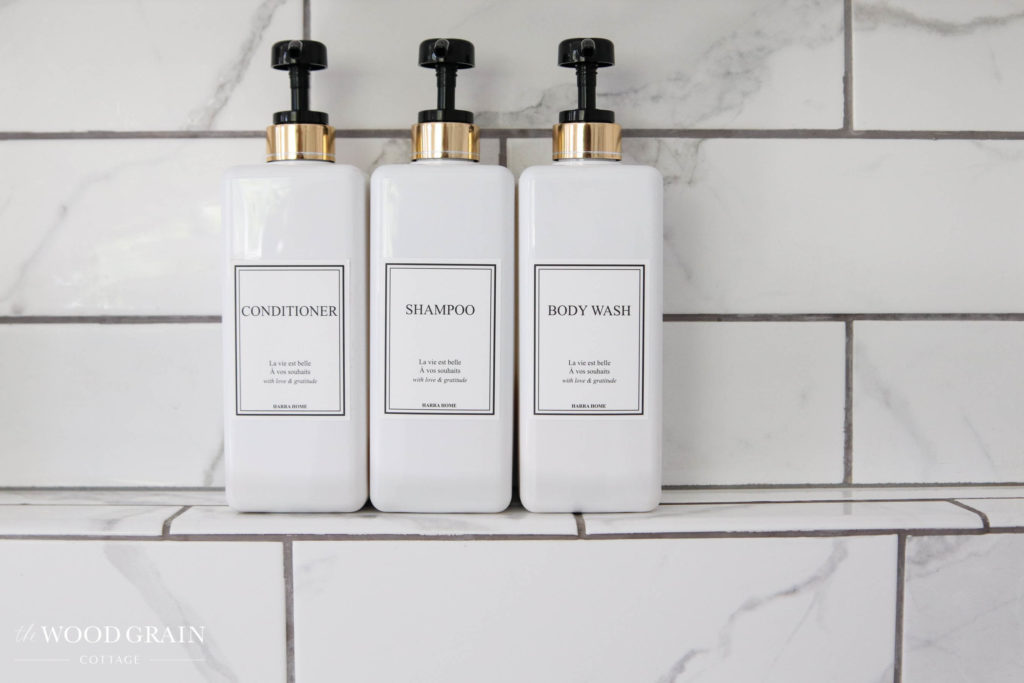 A picture of our shower niche and soap bottles. 