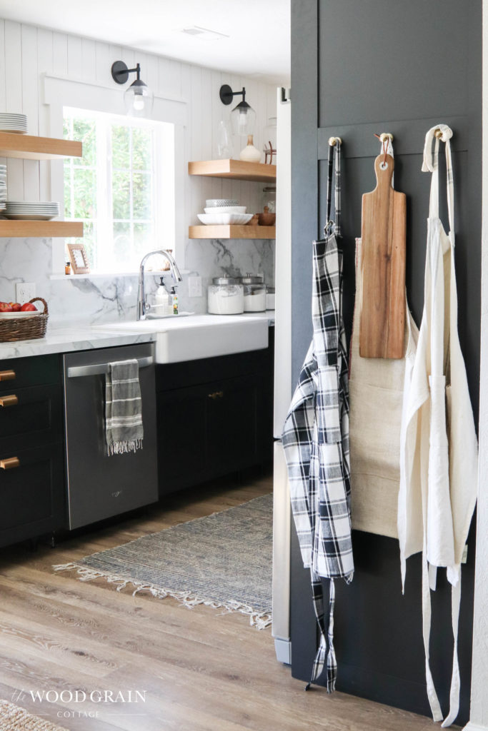A picture showing the kitchen and apron wall. 