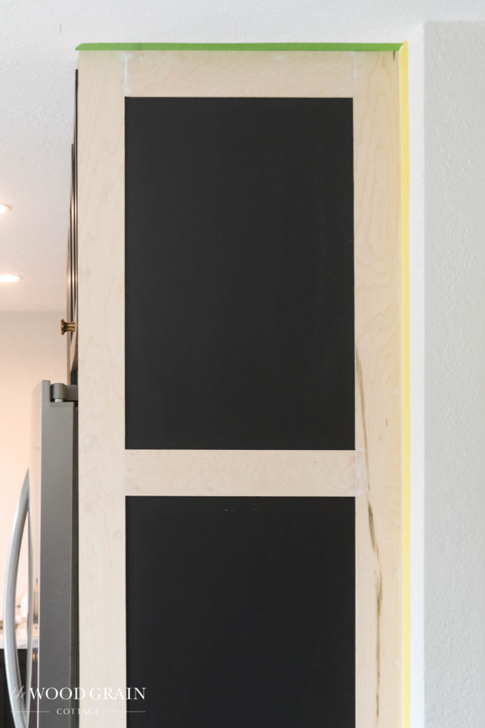 A picture of the cabinet being prepped for painting. 