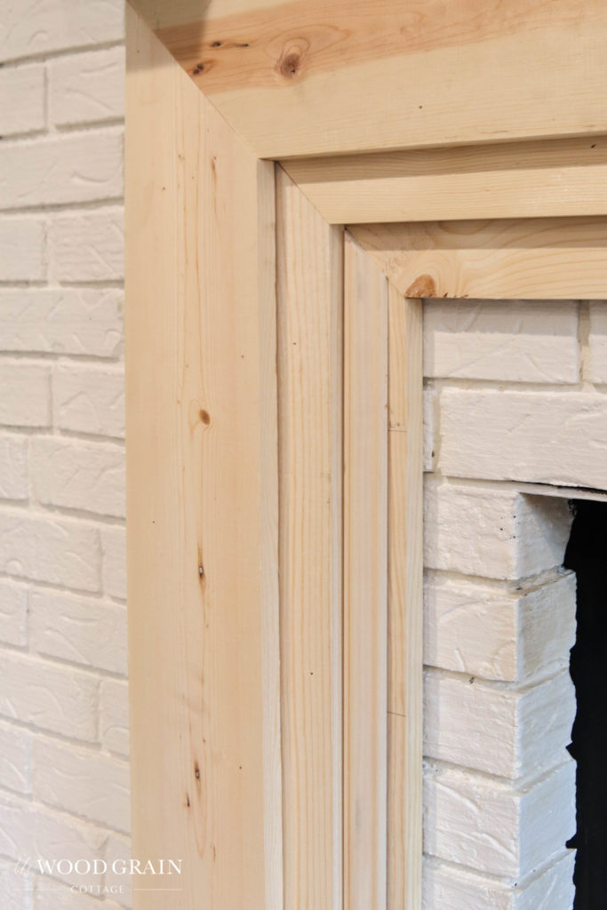 A picture of the 4" trim installed around the fireplace.