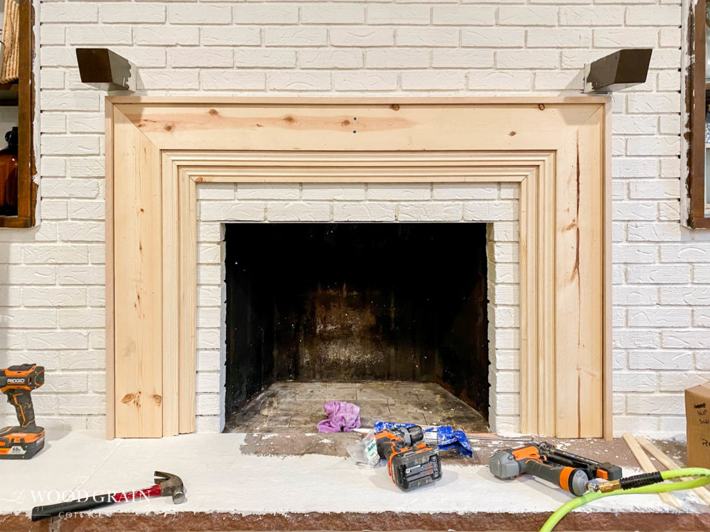 A picture showing the finished fireplace trim.