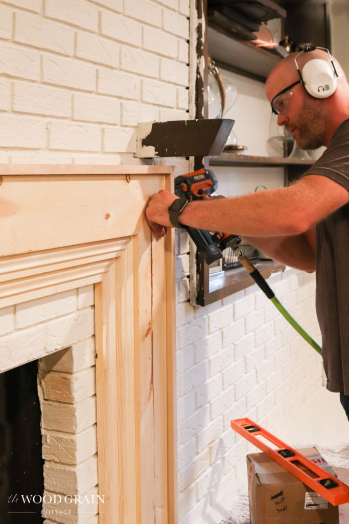 A picture of the cap being installed on the trim. 