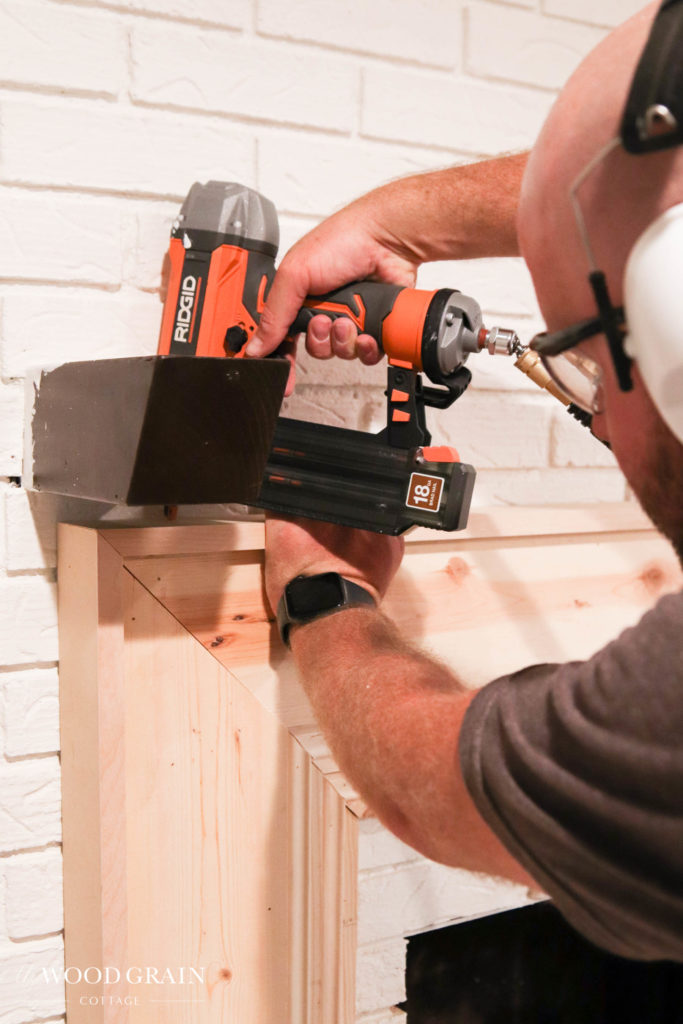 A picture of the cap being installed on the trim. 