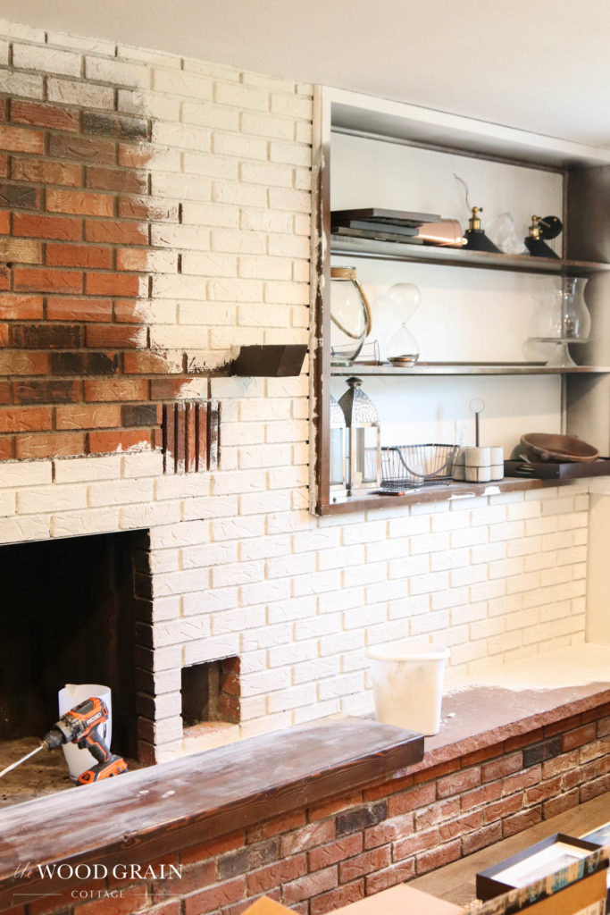 A picture of the brick being painted. 