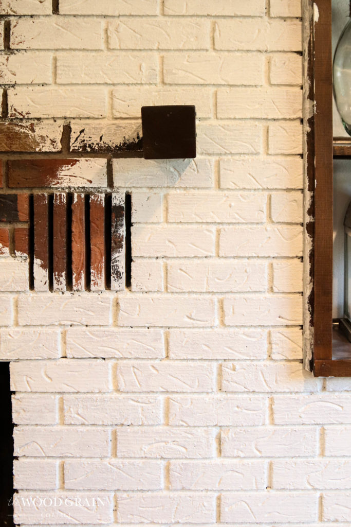 A picture of the brick being painted. 