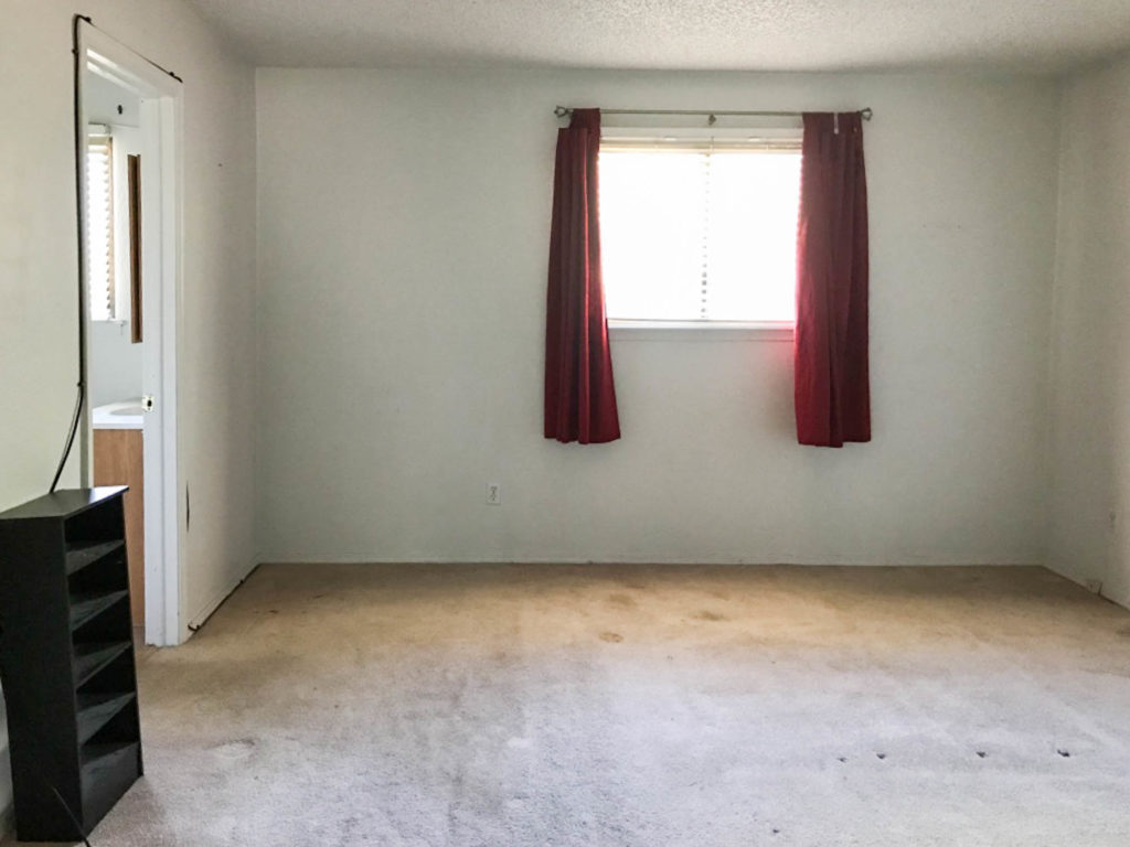 A picture of the master bedroom when we bought the house. 
