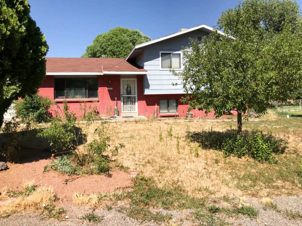 A picture of the exterior of our home when we first bought the house.