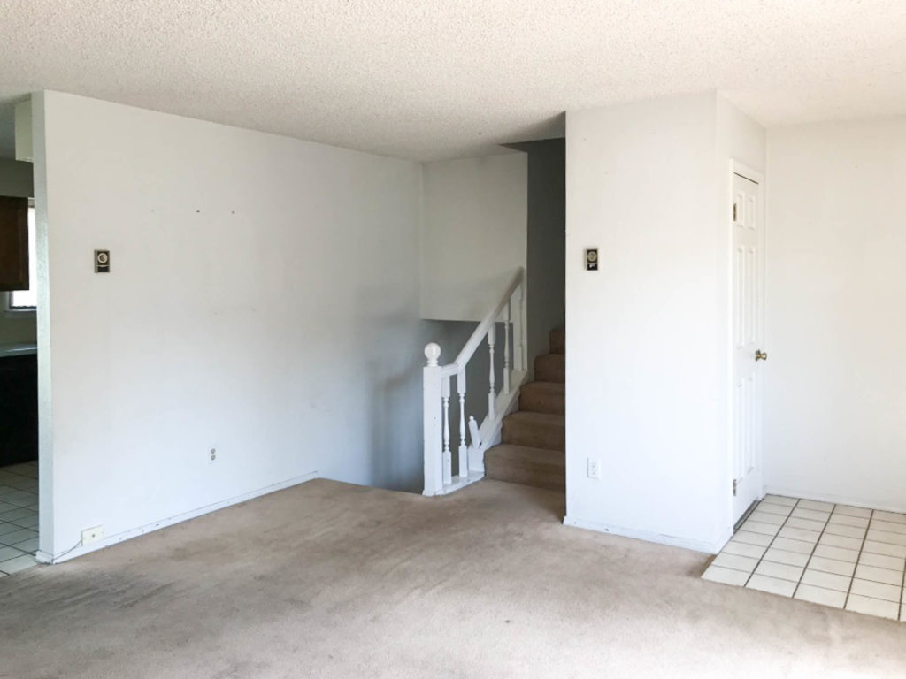 A picture of the stairs when we bought the house. 