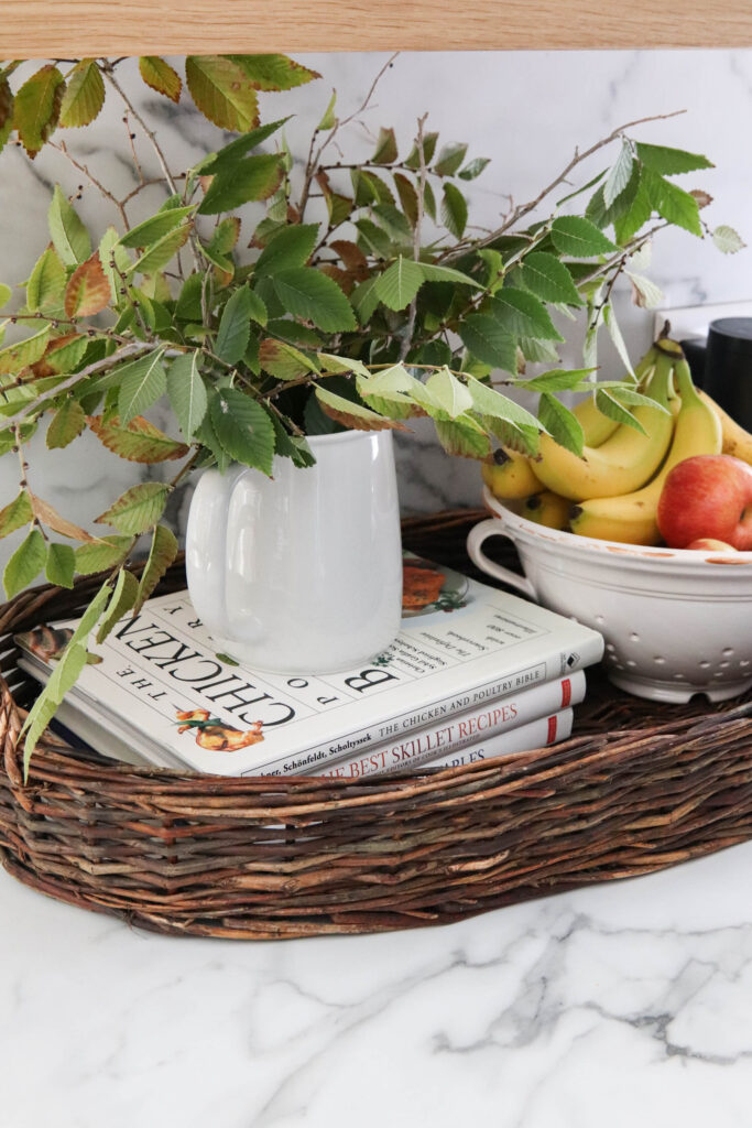 A picture showing cookbooks in my countertop basket.