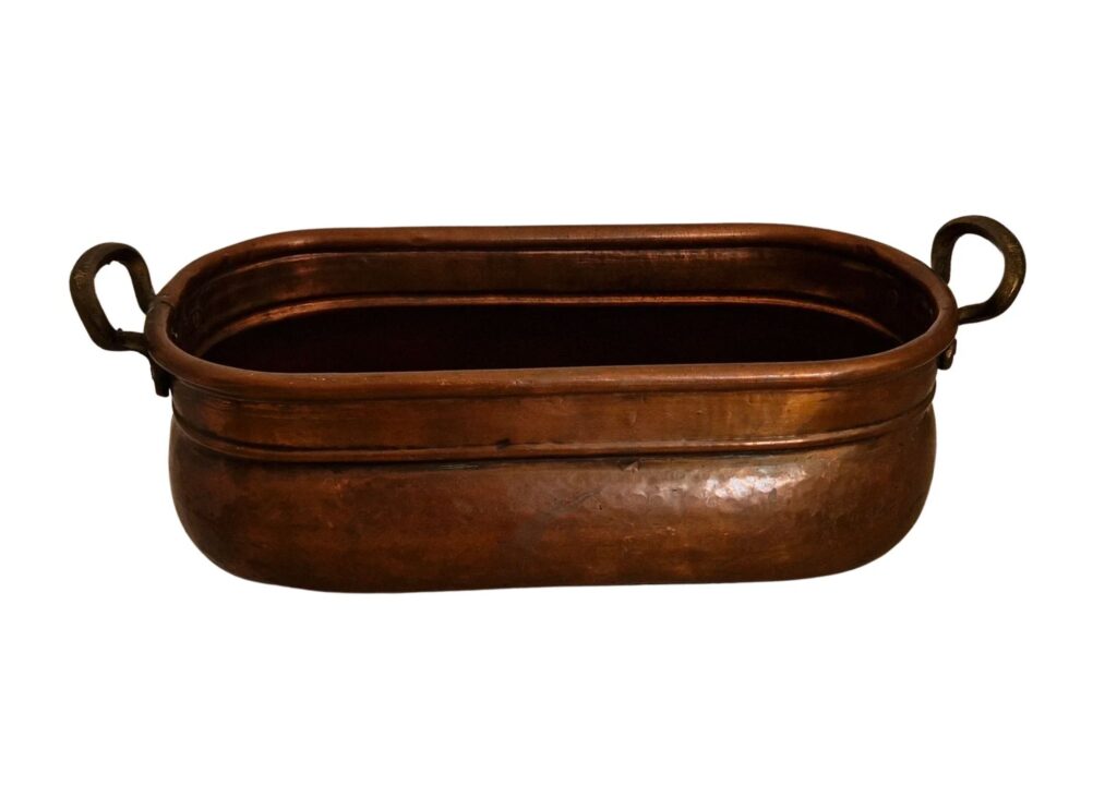 A picture showing my antique copper planter. 