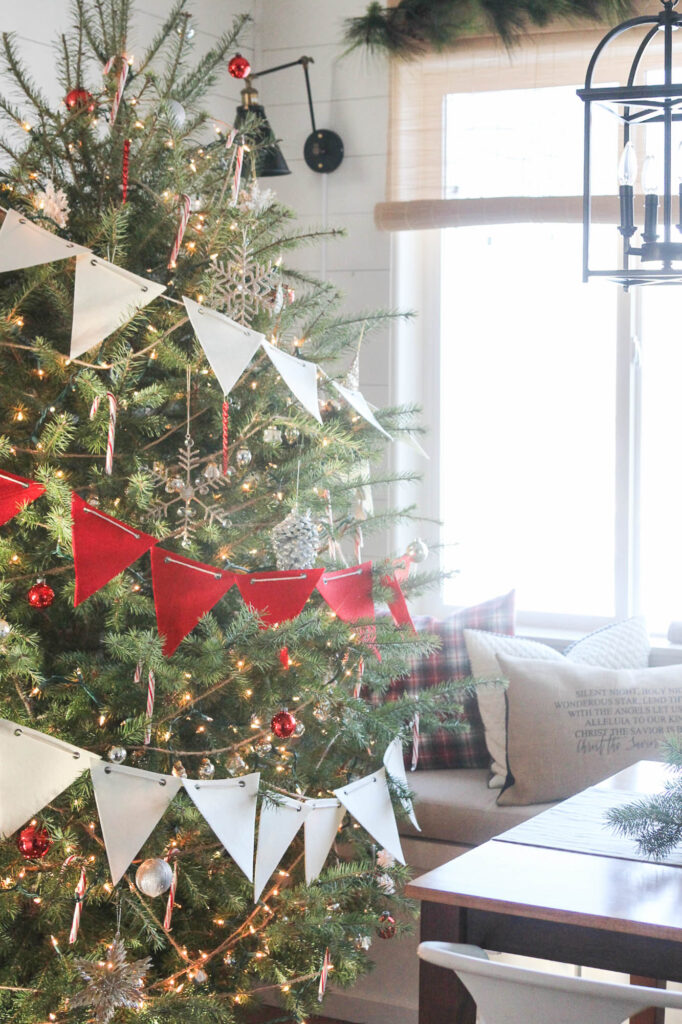 A close up picture of the candy cane tree and the bunting. 
